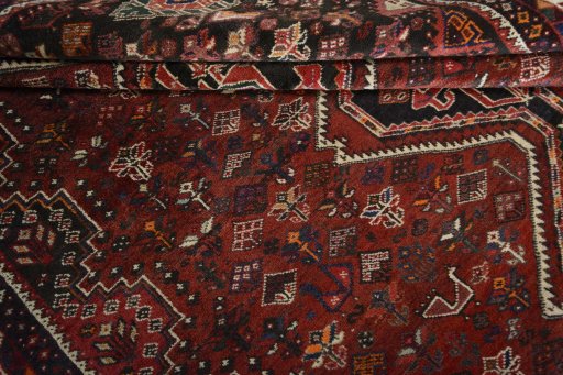 Full view of 2000s Shiraz rug from Iran / Persia, 315 × 242 cm in Red tones