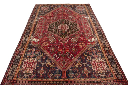 Surface texture of 2000s Shiraz rug with natural Wool and intricate pattern