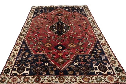 Surface texture of 2000s Shiraz rug with natural Wool and intricate pattern