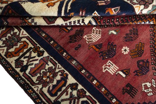 Close-up detail of 2000s Shiraz rug from Iran / Persia showing Wool weave