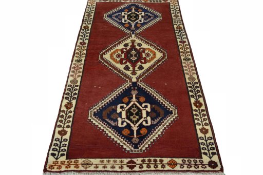 Surface texture of 2000s Shiraz rug with natural Wool and intricate pattern
