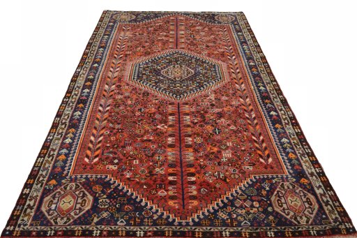 Surface texture of 2000s Shiraz rug with natural Wool and intricate pattern