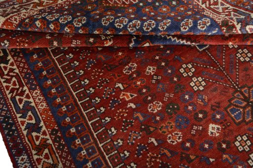 Close-up detail of 2000s Shiraz rug from Iran / Persia showing Wool weave