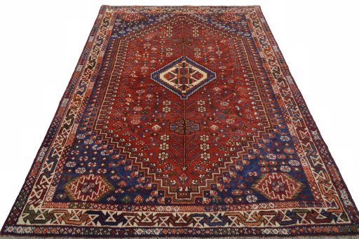 Surface texture of 2000s Shiraz rug with natural Wool and intricate pattern