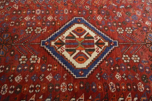 Central medallion detail of 2000s Shiraz rug from Iran / Persia