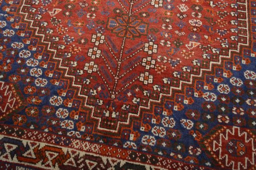 Close-up detail of 2000s Shiraz rug from Iran / Persia showing Wool weave