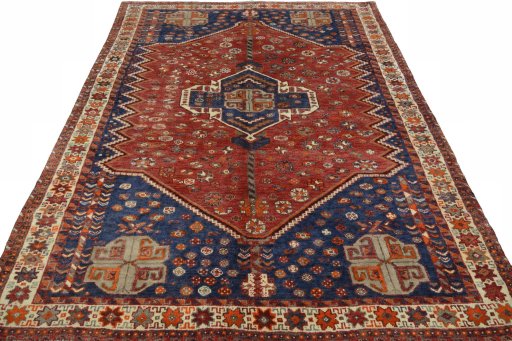 Surface texture of 2000s Shiraz rug with natural Wool and intricate pattern