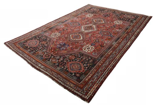 Corner detail of 2000s Shiraz rug showing border pattern and Wool pile