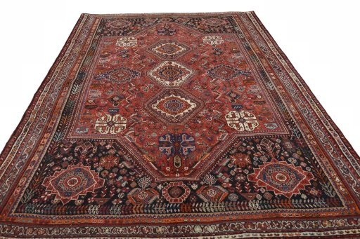 Surface texture of 2000s Shiraz rug with natural Wool and intricate pattern