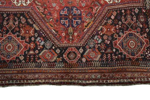 Central medallion detail of 2000s Shiraz rug from Iran / Persia