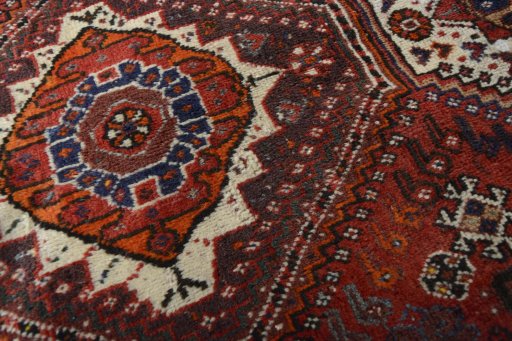 Full view of 2000s Shiraz rug from Iran / Persia, 318 × 214 cm in Red tones