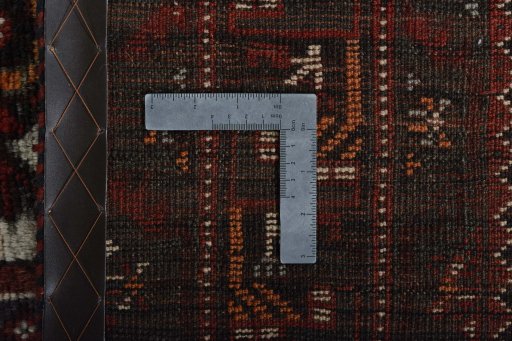 Backside of handmade 2000s Shiraz rug showing knot structure and weave density