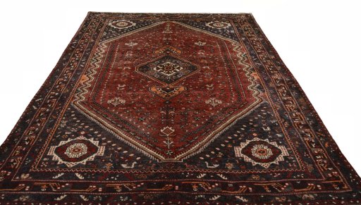 Surface texture of 2000s Shiraz rug with natural Wool and intricate pattern
