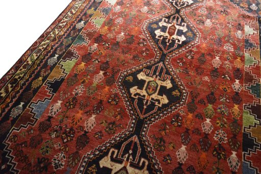 Backside of handmade 2000s Shiraz rug showing knot structure and weave density