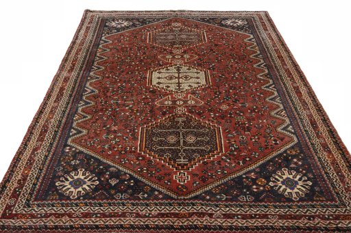 Surface texture of 2000s Shiraz rug with natural Wool and intricate pattern