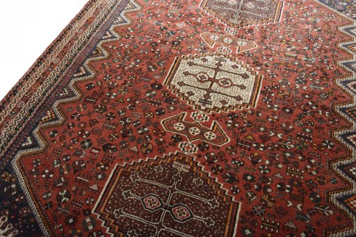 Backside of handmade 2000s Shiraz rug showing knot structure and weave density