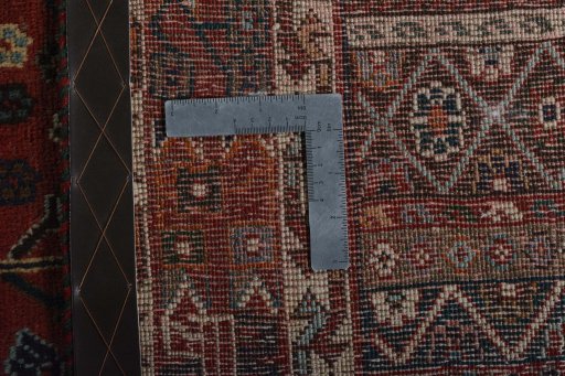 Surface texture of 2000s Shiraz rug with natural Wool and intricate pattern