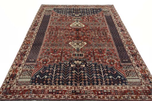 Surface texture of 2000s Shiraz rug with natural Wool and intricate pattern