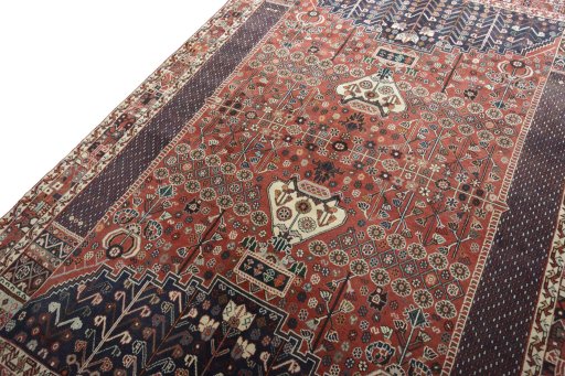 Backside of handmade 2000s Shiraz rug showing knot structure and weave density