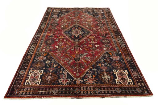 Surface texture of 2000s Shiraz rug with natural Wool and intricate pattern