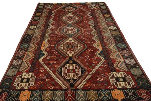 Surface texture of 2000s Shiraz rug with natural Wool and intricate pattern