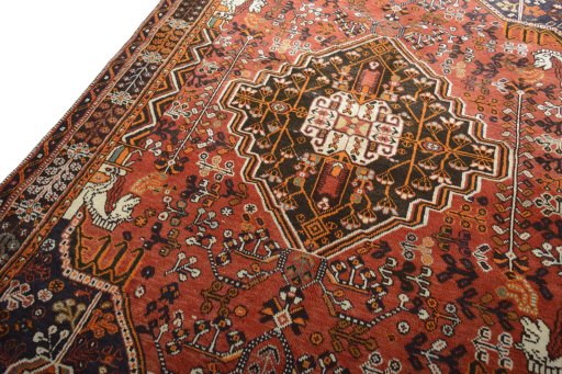 Backside of handmade 2000s Shiraz rug showing knot structure and weave density