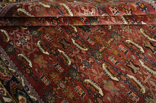 Full view of 2000s Shiraz rug from Iran / Persia, 293 × 200 cm in Red tones