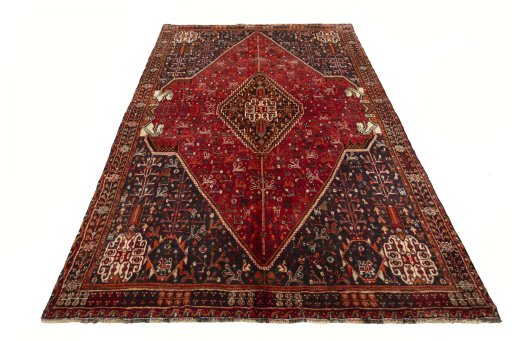 Surface texture of 2000s Shiraz rug with natural Wool and intricate pattern