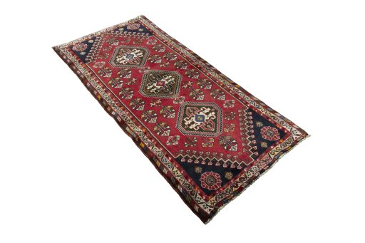 Close-up detail of 2000s Shiraz rug from Iran / Persia showing Wool weave