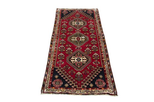 Surface texture of 2000s Shiraz rug with natural Wool and intricate pattern