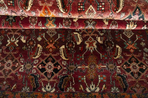 Full view of 2000s Shiraz rug from Iran / Persia, 228 × 145 cm in Red tones