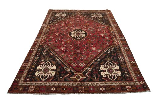 Surface texture of 2000s Shiraz rug with natural Wool and intricate pattern