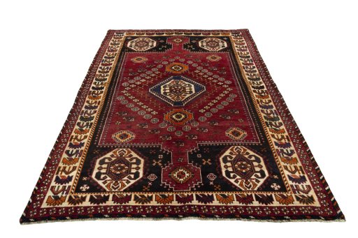Surface texture of 2000s Shiraz rug with natural Wool and intricate pattern