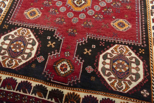 Close-up detail of 2000s Shiraz rug from Iran / Persia showing Wool weave