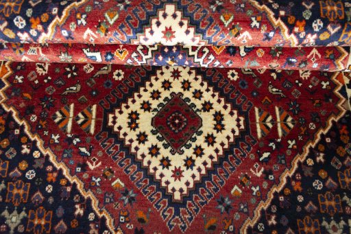 Full view of 2000s Shiraz rug from Iran / Persia, 190 × 118 cm in Red tones
