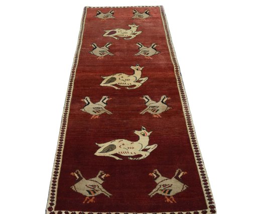 Surface texture of 2000s Shiraz rug with natural Wool and intricate pattern