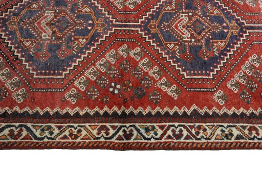 Close-up detail of 2000s Shiraz rug from Iran / Persia showing Wool weave