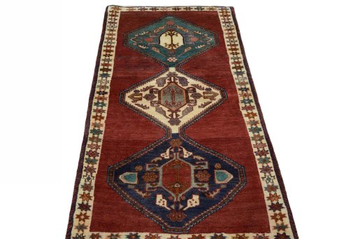 Surface texture of 2000s Shiraz rug with natural Wool and intricate pattern