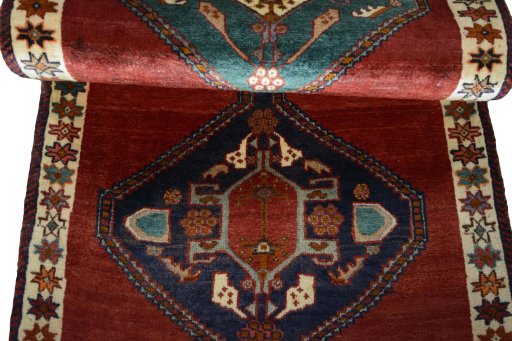 Full view of 2000s Shiraz rug from Iran / Persia, 172 × 85 cm in Red tones