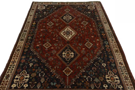 Surface texture of 2000s Shiraz rug with natural Wool and intricate pattern