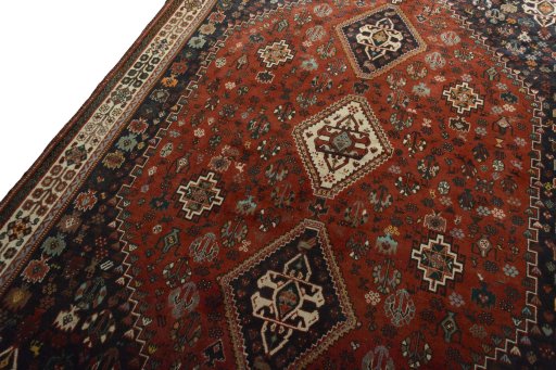 Backside of handmade 2000s Shiraz rug showing knot structure and weave density