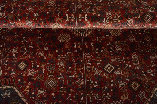 Corner detail of 2000s Shiraz rug showing border pattern and Wool pile