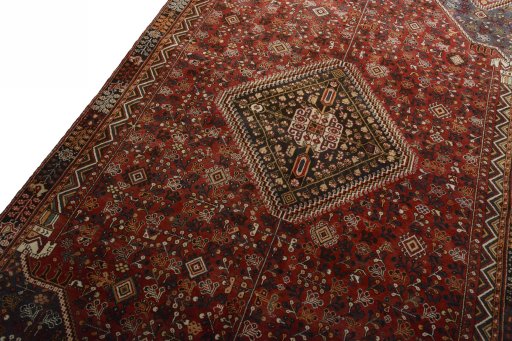 Backside of handmade 2000s Shiraz rug showing knot structure and weave density