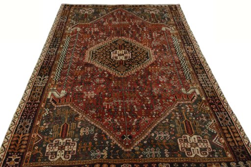 Surface texture of 2000s Shiraz rug with natural Wool and intricate pattern
