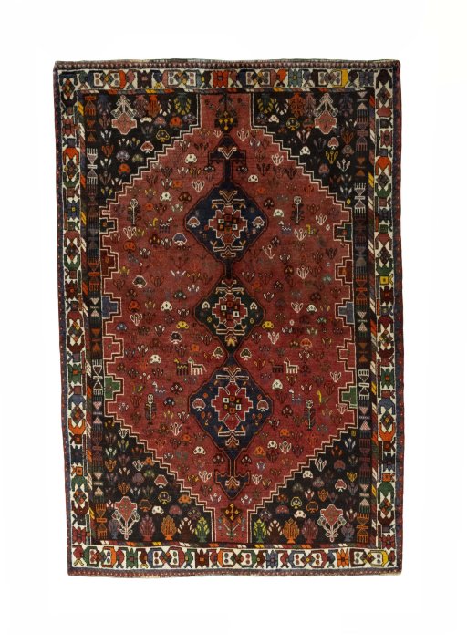 Full view of 1970s Shiraz rug from Iran / Persia, 256 × 172 cm in Red tones