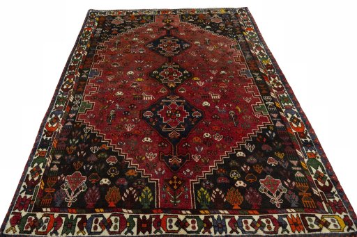 Surface texture of 1970s Shiraz rug with natural Wool and intricate pattern
