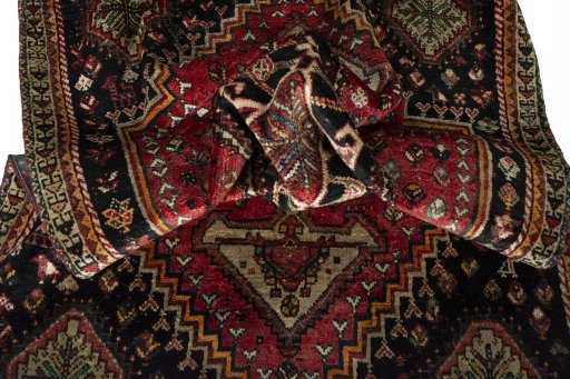 Close-up detail of 1970s Shiraz rug from Iran / Persia showing Wool weave