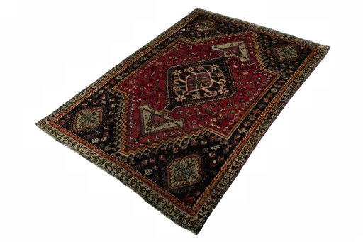 Corner detail of 1970s Shiraz rug showing border pattern and Wool pile