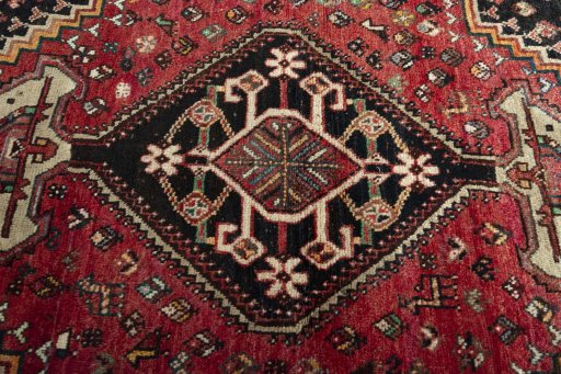 Central medallion detail of 1970s Shiraz rug from Iran / Persia