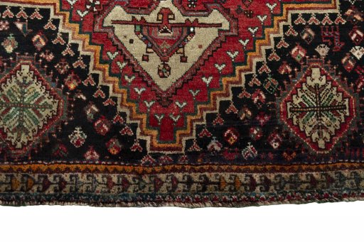 Close-up detail of 1970s Shiraz rug from Iran / Persia showing Wool weave